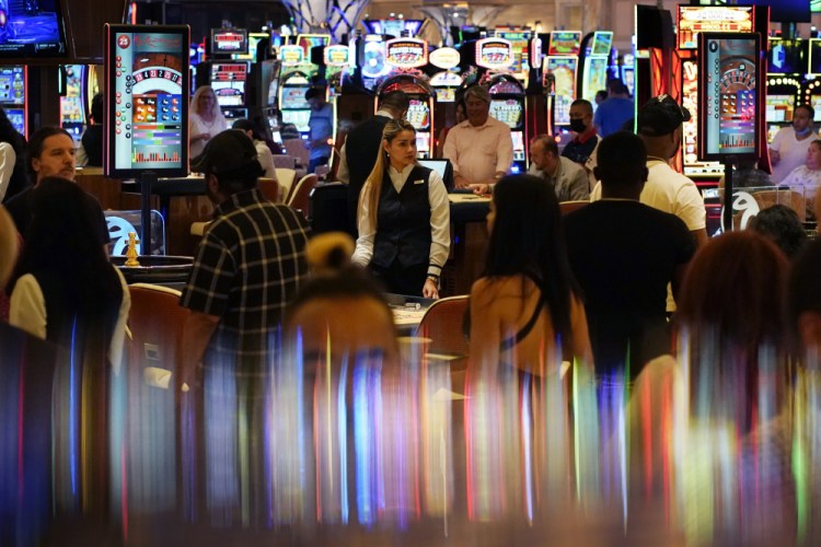 Crowds walk through the casino during June 24, the opening night of Resorts World Las Vegas. 

