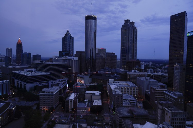 Clouds roll into downtown Atlanta on Wednesday.  The Census Bureau has issued its most detailed portrait yet of how the U.S. has changed over the past decade, and it has become more diverse and more urban.