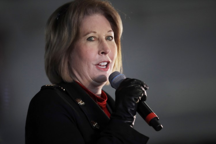 Trump ally Sidney Powell, shown in December 2020, faces financial penalties and other sanctions after a judge found she and her legal team had abused the court system with a lawsuit that challenged Michigan's election results that certified Joe Biden as the winner. Among the sanctions: They must attend 12 hours of legal education, including six hours in election law. 