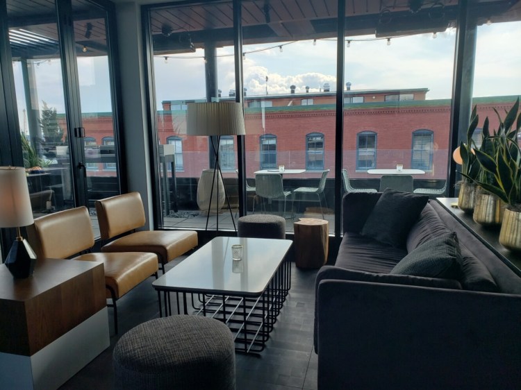 Inside tables are easier to come by than outdoor ones on the roof at Luna in Portland.