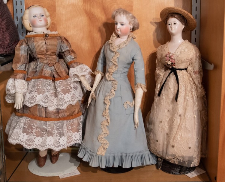 These three dolls are apart of a larger collection on display at the Titcomb House in Farmington.