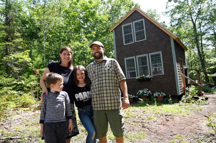 BRISTOL, ME - AUGUST 20: The Herrick Family outside their hipcamp cabin in Bristol Friday, August 20, 2021. L to R are Oliver, 6, Cacy, Emma 10, and Dana. (Staff Photo by Shawn Patrick Ouellette/Staff Photographer)