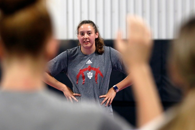 Former Gorham High basketball star Mackenzie Holmes – the leading scorer for Indiana University last winter – takes a question from a participant during a basketball clinic at the Maine Basketball Club in Lewiston on Aug. 12.