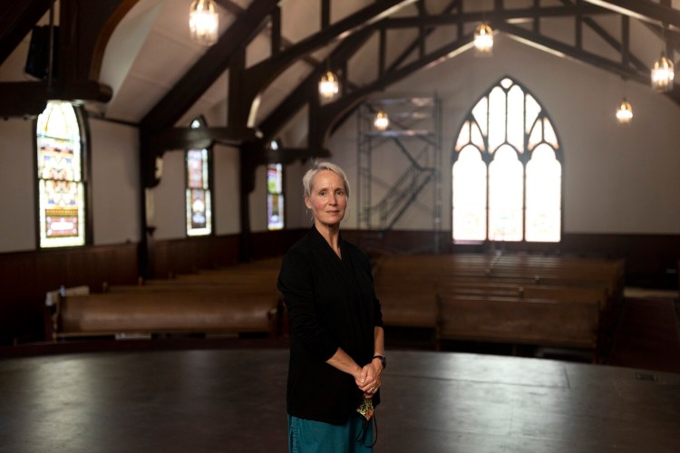 FREEPORT, ME - AUGUST 25: Dana Wieluns Legawiec, the executive director of the Arts & Cultural Alliance of Freeport, at Meeting House Arts on Thursday, August 26, 2021. The new art gallery and performance space is within the existing First Parish Church Congregational on Main Street. Meeting House Arts and the church will share the worship space, which will continued to be used by the church on Sundays and holidays. (Staff photo by Brianna Soukup/Staff Photographer)