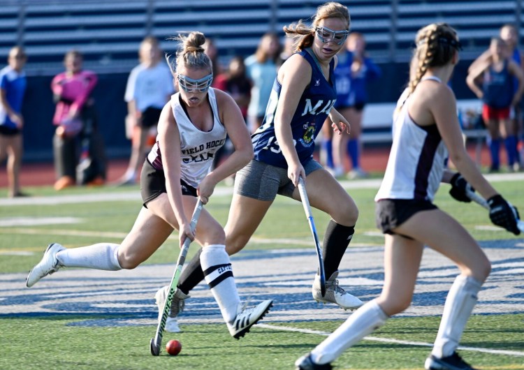 PORTLAND, ME - AUGUST 27: Carrie Grace of Noble drives with the ball against Kennebunk during the SMAA Field Hockey Play Day Friday, August 27, 2021. (Staff Photo by Shawn Patrick Ouellette/Staff Photographer)