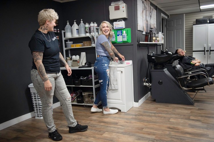 Christina Tucci, left, and her wife, Breeanna, center, own Tucci & Co. Salon together. Reagan Nadeau, right, is a regular client of the Lewiston salon.