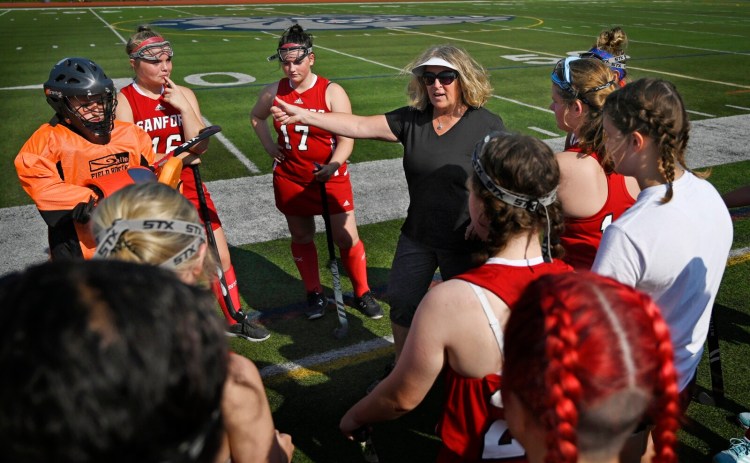 PORTLAND, ME - AUGUST 27: Sanford coach Diana Walker talks with her team before a game at the SMAA Field Hockey Play Day Friday, August 27, 2021. (Staff Photo by Shawn Patrick Ouellette/Staff Photographer)