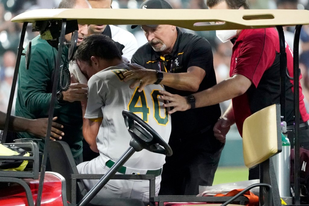 Photos: A's Bassitt returns to mound weeks after being hit in face with  line drive