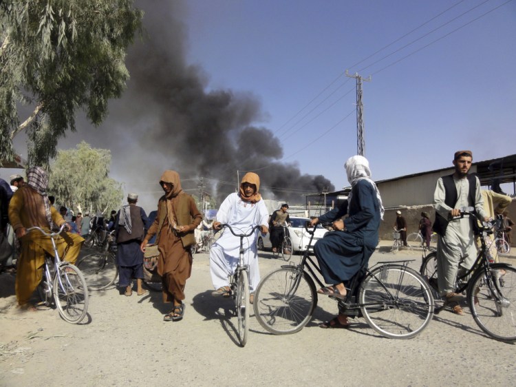 Smoke rises after fighting between the Taliban and Afghan security personnel in Kandahar, southwest of Kabul, Afghanistan, on Thursday. 