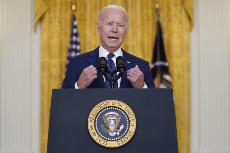President Biden speaks from the White House on Thursday about the bombings at the Kabul airport that killed at least 12 U.S. service members. He said, “We will respond with force and precision at our time, at the place of our choosing.”