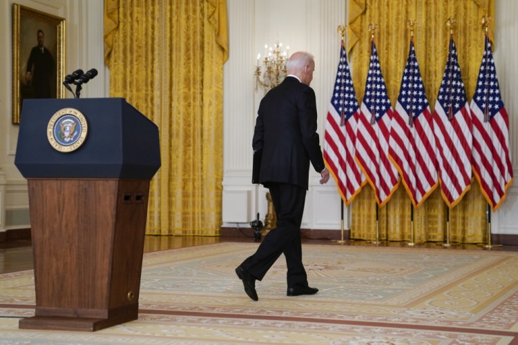 President Biden walks from the podium after speaking about Afghanistan from the East Room of the White House on Monday in Washington. 
