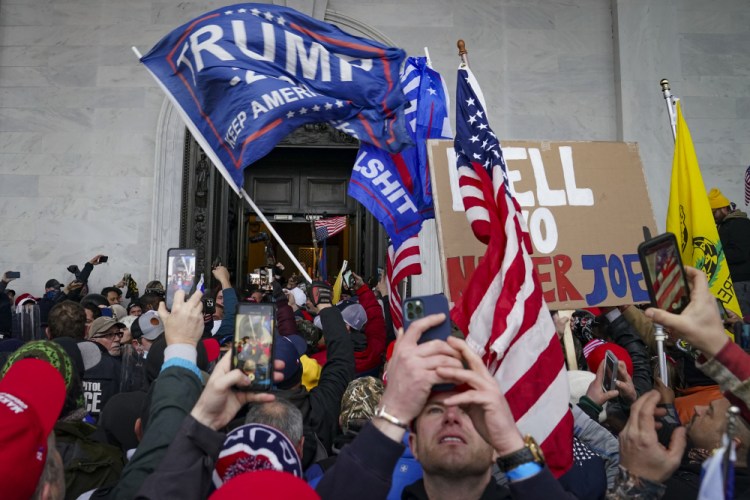 Insurrections loyal to President Trump riot outside the Capitol in Washington on Jan. 6. The House panel investigation of the riot at the U.S. Capitol issued sweeping document requests on Friday to social media companies. 