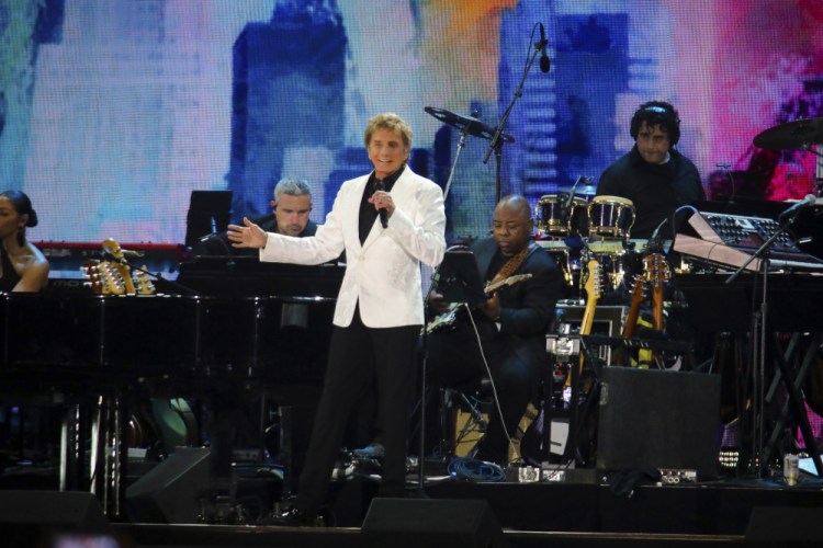 Barry Manilow performs  in Central Park on Saturday in New York. 

