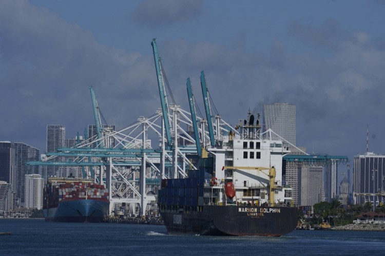 The Warnow-Dolphin container ship enters PortMiami on April 29 in Miami Beach, Fla.