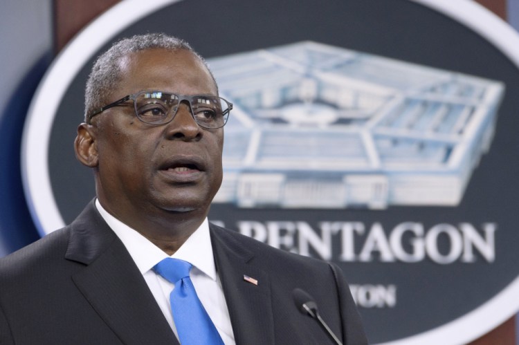Defense Secretary Lloyd Austin speaks at a press briefing at the Pentagon in Washington on July 21. Austin has said he is working expeditiously to make the COVID-19 vaccine mandatory for military personnel and is expected to ask Biden to waive a federal law that requires individuals be given a choice if the vaccine is not fully licensed. 