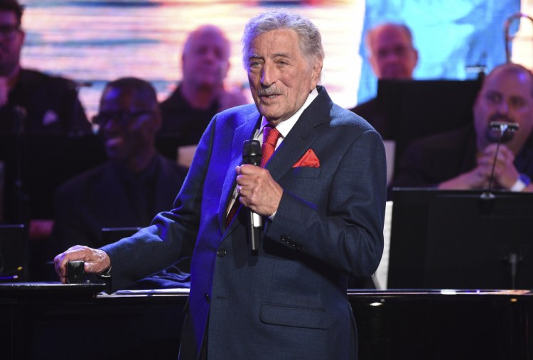 Tony Bennett performs at the Statue of Liberty Museum opening celebration in 2019 in New York. 

