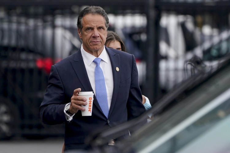 New York Gov. Andrew Cuomo prepares to board a helicopter after announcing his resignation Aug. 10 in New York. 