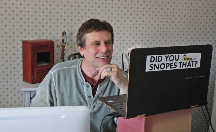 David Mikkelson, founder of Snopes, the site that tracks fakery on the web, in his home office in Tacoma, Wash., in 2018.