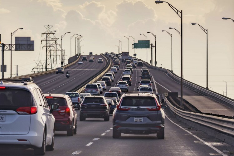 Vehicles head slowly east on the Interstate-10 twin spans leaving New Orleans while only a trickle of cars heads west back into the city Saturday before landfall of Hurricane Ida in New Orleans,.

