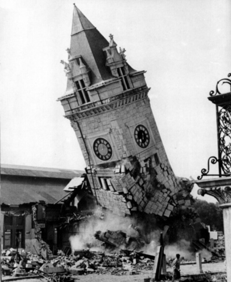 The distinctive 138-foot-tall clock tower crumbles to the ground as Union Station is demolished in 1961 to make way for a strip mall.