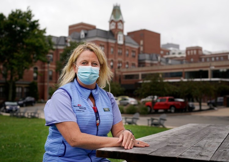 PORTLAND, ME - SEPTEMBER 2: Shannon Calvert, an ICU nurse at Maine Medical Center, photographed outside the hospital in Portland on Thursday, September 2, 2021. (Staff photo by Gregory Rec/Staff Photographer)