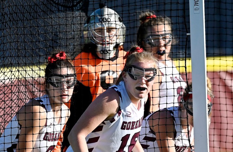 GORHAM, ME - SEPTEMBER 20: Gorham defenders prepare for a penalty corner against Falmouth wearing traditional goggles Monday, September 20, 2021. (Staff Photo by Shawn Patrick Ouellette/Staff Photographer)