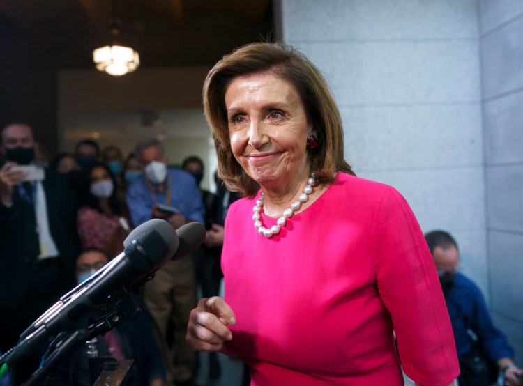 House Speaker Nancy Pelosi, D-Calif., updates reporters following a Democratic Caucus meeting in the basement of the Capitol in Washington, Tuesday, Sept. 28, 2021. Work continues behind the scenes on President Joe Biden's domestic agenda and a bill to fund the the government. (AP Photo/J. Scott Applewhite)