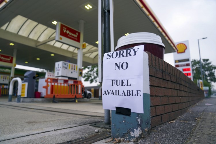 A view of a sign at a petrol station, in Bracknell England, Sunday.