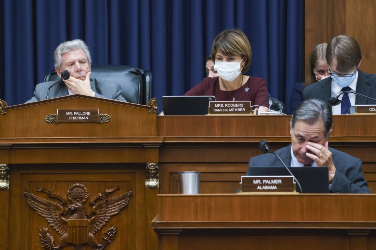 House Energy and Commerce Chairman Frank Pallone, D-N.J., left, with Rep. Cathy McMorris Rodgers, R-Wash., the ranking member, work on the "Build Back Better" package, a cornerstone of President Biden's domestic agenda, at the Capitol in Washington on Wednesday. 