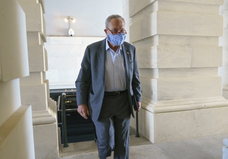Senate Majority Leader Chuck Schumer, D-N.Y., arrives at the Capitol in Washington, Thursday, Sept. 30, 2021. 