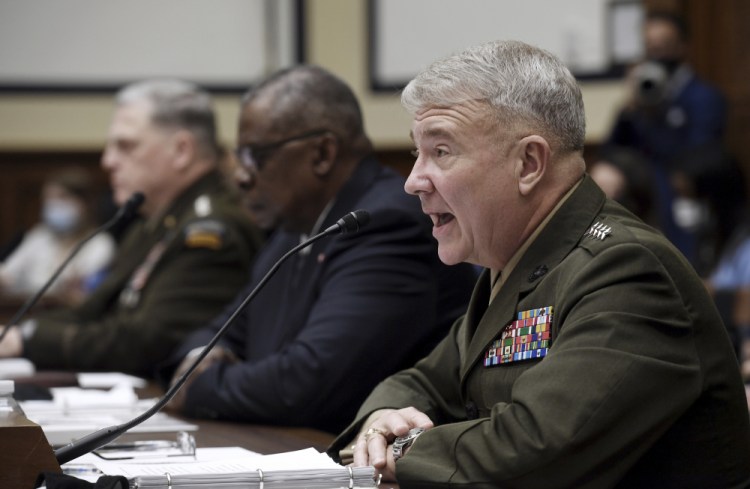 Marine Corps Gen. Kenneth F. McKenzie, commander of U.S. Central Command, testifies before the House Armed Services Committee on the conclusion of military operations in Afghanistan, on Wednesday on Capitol Hill in Washington. 