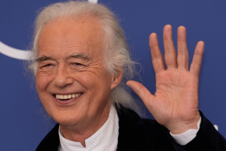 Musician Jimmy Page poses at the photo call of the movie 'Becoming Led Zeppelin' at the 78th edition of the Venice Film Festival at the Venice Lido, Italy, on Saturday. The festival is on through Sept. 11. 