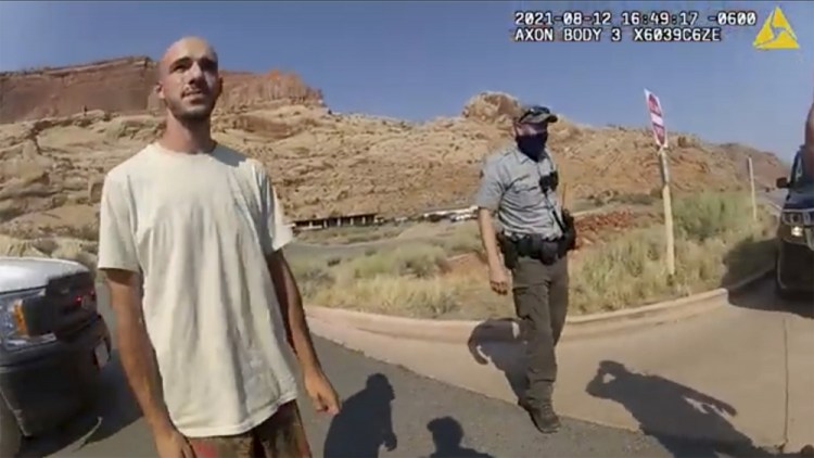 This police camera video provided by The Moab Police Department shows Brian Laundrie  talking to a police officer after police pulled over the van he was traveling in with his girlfriend, Gabrielle “Gabby” Petito, near the entrance to Arches National Park on Aug. 12, 2021. 