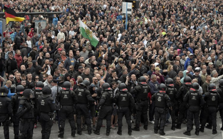 Demonstrators shout during a far-right protest in Chemnitz, Germany, on Aug. 27. In September 2021, there were at least 54 Facebook profiles belonging to 39 entities that the German government and civil society groups have flagged as extremist. 