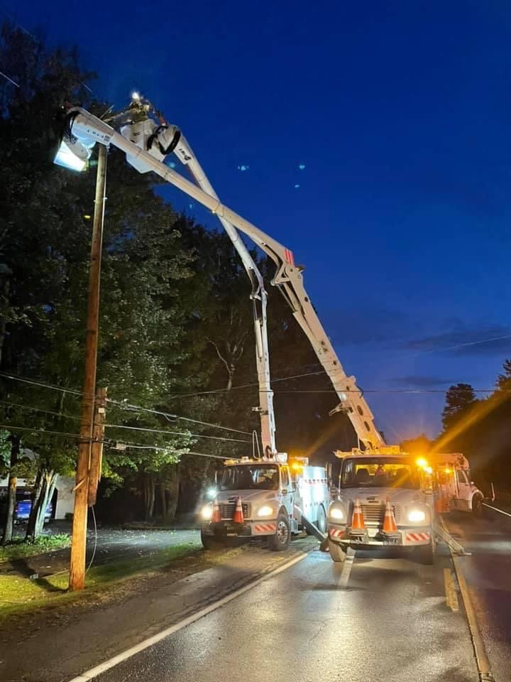 Central Maine Power crews work Saturday morning to replace a utility pole damaged in a single-car crash on Riverside Drive in Vassalboro. Power was restored to the area around 8 a.m. 