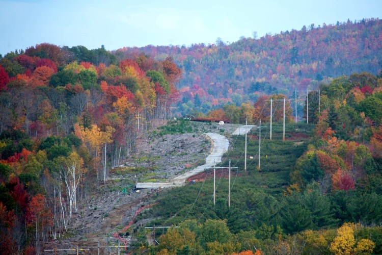 Construction crews continue to widen the existing tract of corridor on Oct. 12 near the Wyman Dam on the Kennebec River in the Somerset County town of Bingham, as part of the $1 billion New England Clean Energy Connect project.