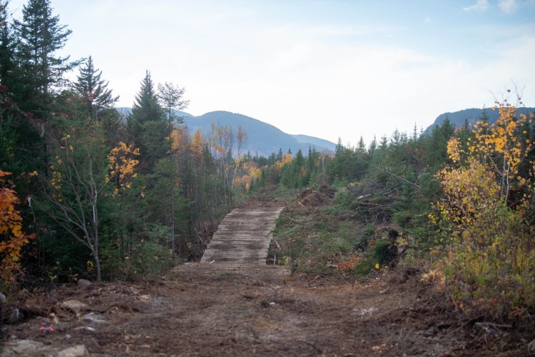 A make-shift bridge is constructed to transport heavy equipment to the NECEC corridor construction sites approximately 15 miles in on Spencer Road in the Unorganized Territories.