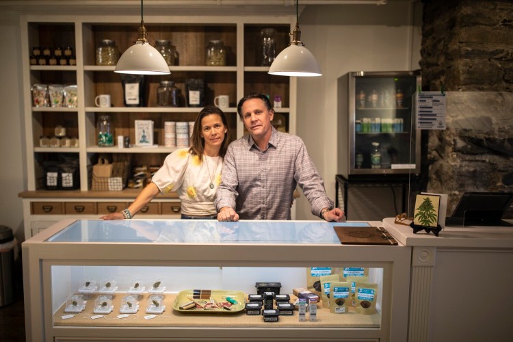 John Kreis and Caroline Savory at their recreational cannabis shop, Portland Greenhouse, in Portland on Tuesday. Kreis is nervous about market saturation within the city's fast-growing industry.