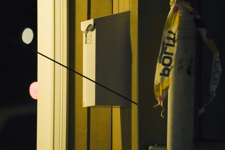 An arrow is seen in the wall after an attack in Kongsberg, Norway, Wednesday. 