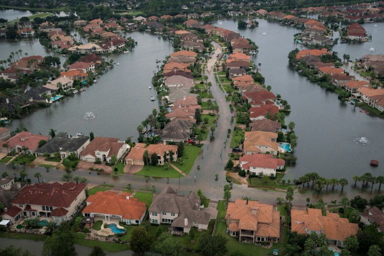 Flooded houses and apartment complexes in West Houston in 2017. MUST CREDIT: Washington Post photo by Jabin Botsford.