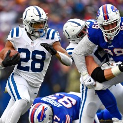 Taylor runs up the score with 5 TDs; Colts beat Bills 41-15