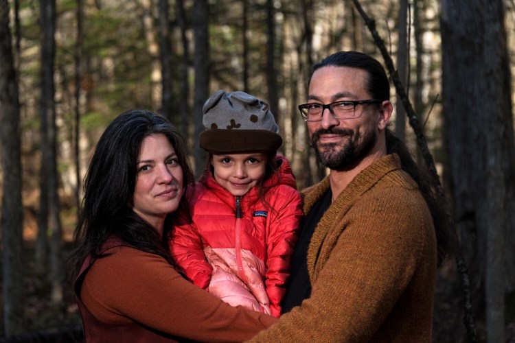 Suzanne Greenlaw and Gabriel Frey of Orono with their daughter Musqon. The couple's children's book "The First Blade of Sweetgrass" came out in August. 