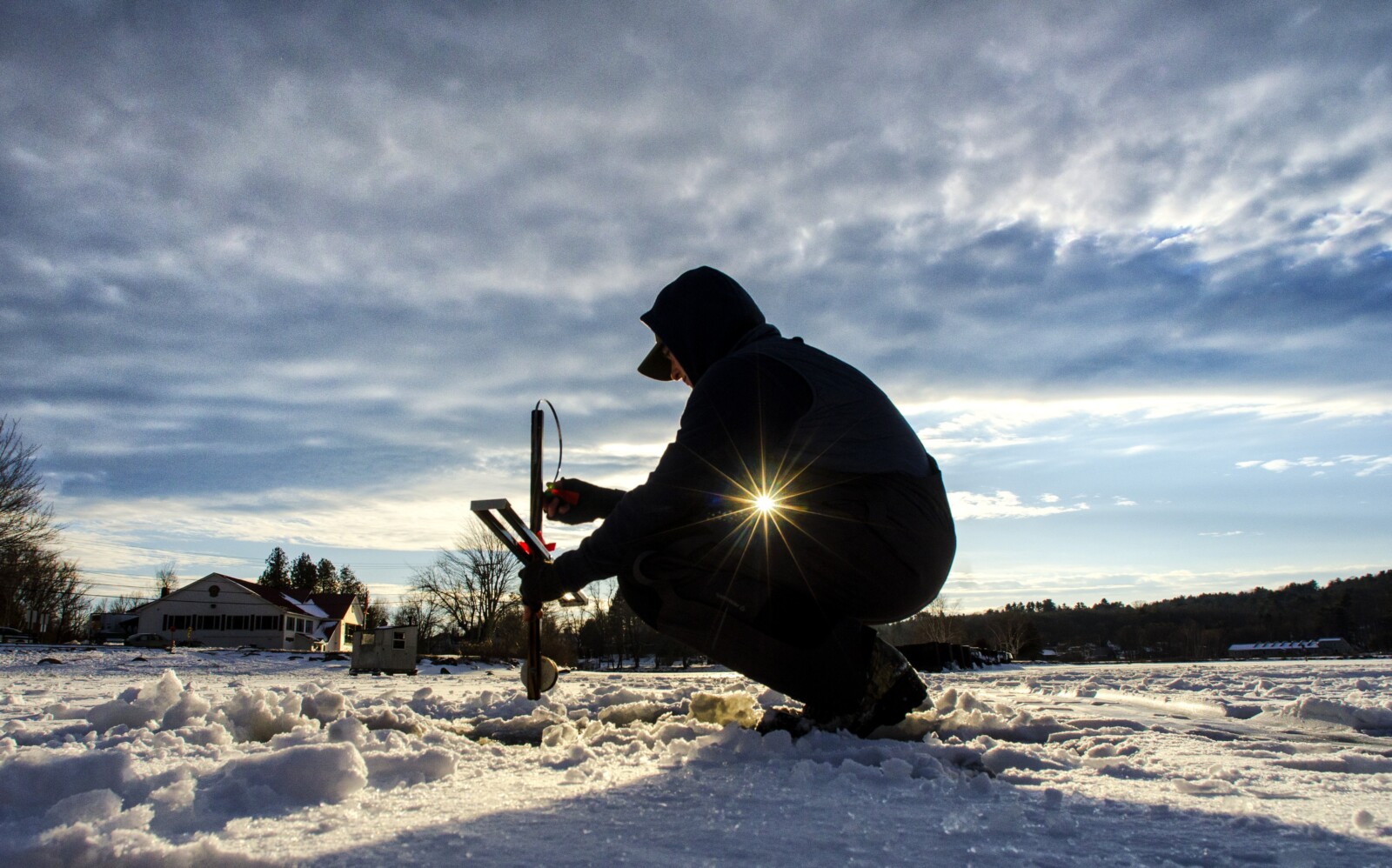 New to ice fishing and currently digging my holes with a hatchet, but I'm  obsessed. Also caught a nice sunset today (NJ) : r/IceFishing