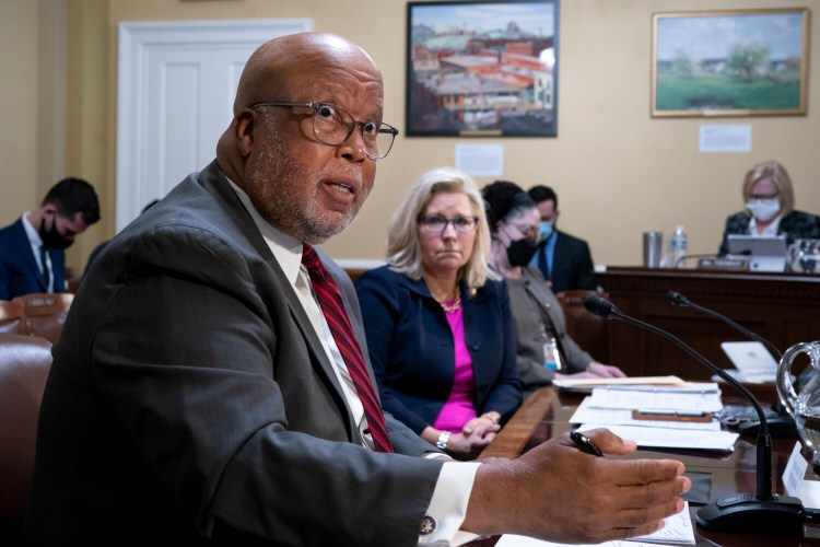 Chairman Bennie Thompson, D-Miss., and Vice Chair Liz Cheney, R-Wyo., of the House panel investigating the Jan. 6 U.S. Capitol insurrection, testify before the House Rules Committee seeking contempt of Congress charges against former President Trump's White House chief of staff Mark Meadows for not complying with a subpoena, at the Capitol in Washington on Tuesday. A House vote to hold him in contempt would refer the charges to the Justice Department, which will decide whether to prosecute the former Republican congressman.
