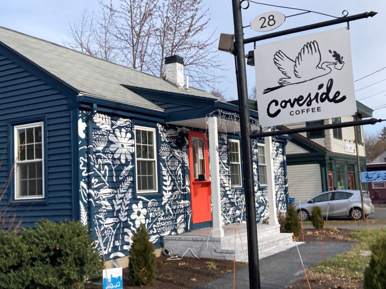 The exterior of the charming Coveside Coffee, with a mural by South Portland artist Tessa Greene O'Brien.