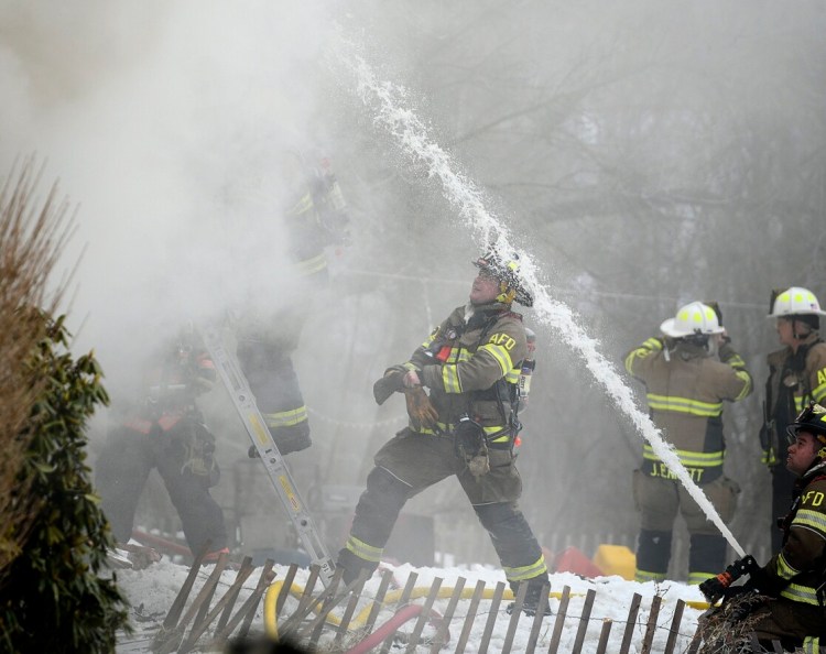 Firefighters extinguish a blaze at a single family residence reported Sunday just before 12:30 p.m. on Washington Street in Augusta.  Chelsea, Vassleboro, Gardiner, Togus and Winthrop Fire Departments responded, while Hallowell’s department provided coverage for the city and Winslow Fire Department lent their latter truck as well as aerial coverage of the city.

