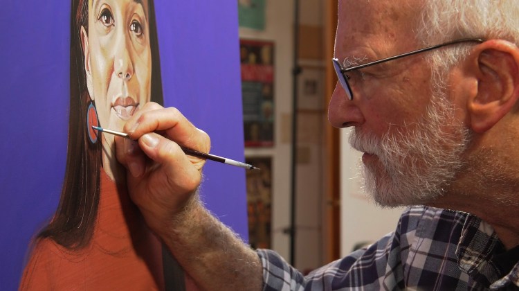 Robert Shetterly paints a portrait of Penobscot activist Maulian Dana in "Truth Tellers." 