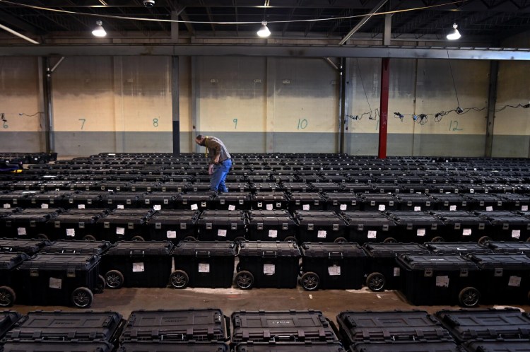 Election precinct suitcases with ballots and keys to voting machines in Allegheny County, Pa., in November 2020. MUST CREDIT: Washington Post photo by Michael S. Williamson