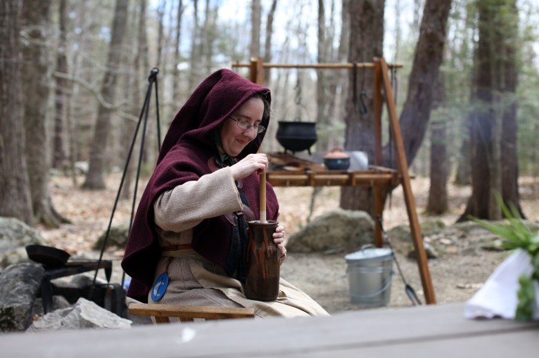 Cooking over an open fire at the campsite, medieval style