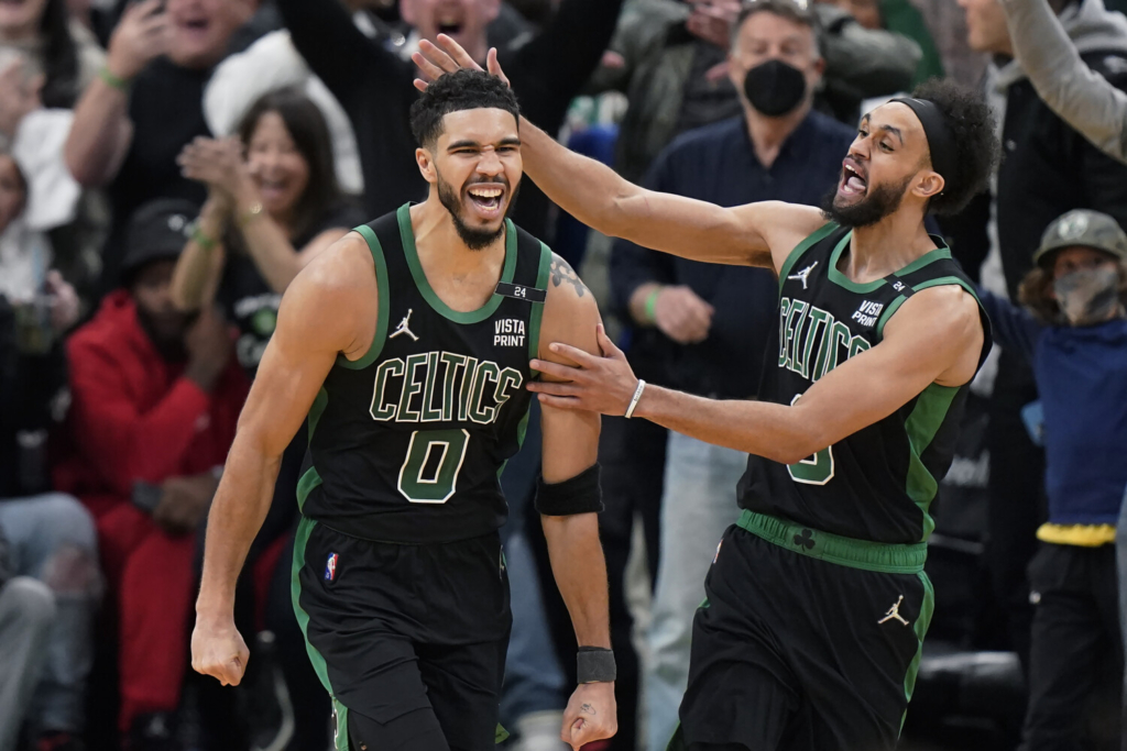 Celtics celebrate world champion Boston Red Sox on court during game